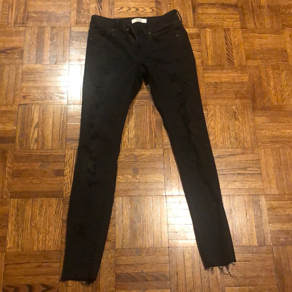 Black distressed denim jeans